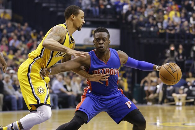 Indiana Pacers guard George Hill (3) defends Detroit Pistons guard Reggie Jackson (1) during the first half of an NBA basketball game in Indianapolis, Saturday, Feb. 6, 2016. (AP Photo/Michael Conroy)