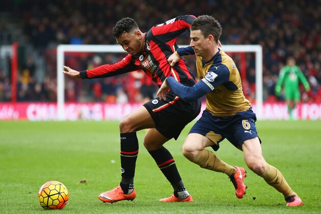 BOURNEMOUTH, ENGLAND - FEBRUARY 07:  Joshua King of Bournemouth tussles with Laurent Koscielny of Arsenal during the Barclays Premier League match between A.F.C. Bournemouth and Arsenal at the Vitality Stadium on February 7, 2016 in Bournemouth, England.  (Photo by Matthew Lewis/Getty Images)