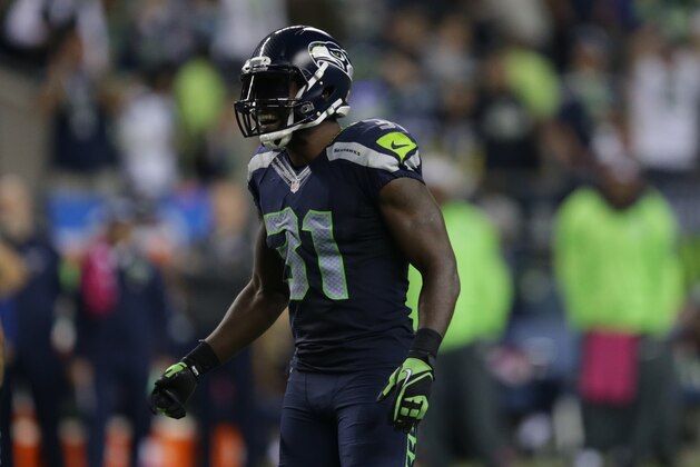 Seattle Seahawks strong safety Kam Chancellor reacts to a play in the second half of an NFL football game against the Detroit Lions, Monday, Oct. 5, 2015, in Seattle. (AP Photo/Scott Eklund)