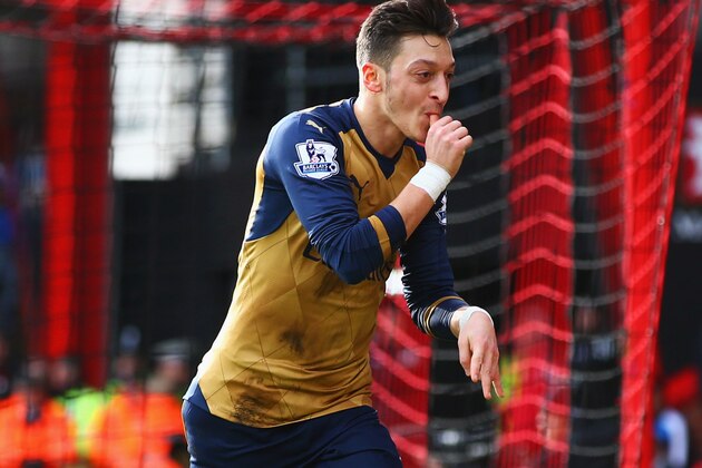 BOURNEMOUTH, ENGLAND - FEBRUARY 07:  Mesut Ozil of Arsenal celebrates as he scores their first goal during the Barclays Premier League match between A.F.C. Bournemouth and Arsenal at the Vitality Stadium on February 7, 2016 in Bournemouth, England.  (Photo by Matthew Lewis/Getty Images)