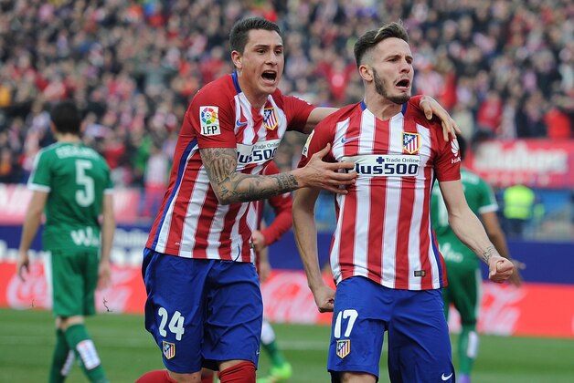 MADRID, SPAIN - FEBRUARY 06:  Saul Niguez (R) of Club Atletico de Madrid celebrates with  Jose Maria Gimenez after scoring his team's 2nd goal during the La Liga match between Club Atletico de Madrid and SD Eibar at Vicente Calderon Stadium on February 6, 2016 in Madrid, Spain.  (Photo by Denis Doyle/Getty Images)