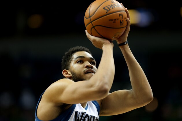 MINNEAPOLIS, MN - FEBRUARY 10:  Karl-Anthony Towns #32 of the Minnesota Timberwolves prepares to shoot a free throw against the Toronto Raptors on February 10, 2016 at Target Center in Minneapolis, Minnesota. NOTE TO USER: User expressly acknowledges and agrees that, by downloading and or using this Photograph, user is consenting to the terms and conditions of the Getty Images License Agreement. Mandatory Copyright Notice: Copyright 2016 NBAE (Photo by Jordan Johnson/NBAE via Getty Images)
