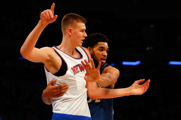 NEW YORK, NY - DECEMBER 16:  (NEW YORK DAILIES OUT)    Karl-Anthony Towns #32 of the Minnesota Timberwolves in action against Kristaps Porzingis #6 of the New York Knicks at Madison Square Garden on December 16, 2015 in New York City. The Knicks defeated the Timberwolves 107-102.  NOTE TO USER: User expressly acknowledges and agrees that, by downloading and/or using this Photograph, user is consenting to the terms and conditions of the Getty Images License Agreement.  (Photo by Jim McIsaac/Getty Images)