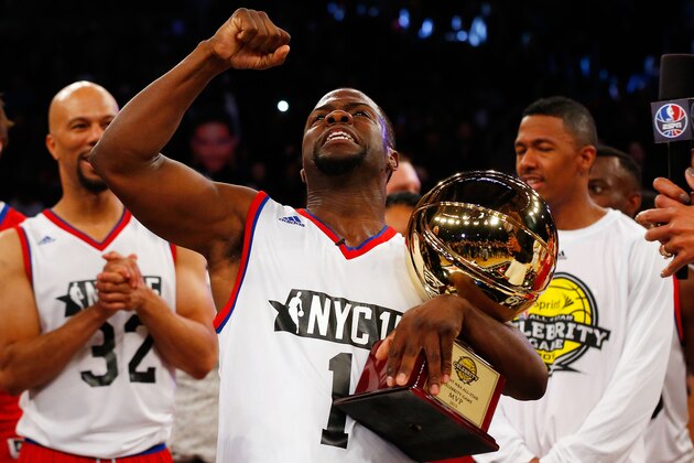 NEW YORK, NY - FEBRUARY 13:  (NEW YORK DAILIES OUT)   Comedian Kevin Hart celebrates with the MVP trophy after the Sprint NBA All-Star Celebrity Game at Madison Square Garden on February 13, 2015 in New York City.  NOTE TO USER: User expressly acknowledges and agrees that, by downloading and/or using this Photograph, user is consenting to the terms and conditions of the Getty Images License Agreement.  (Photo by Jim McIsaac/Getty Images)