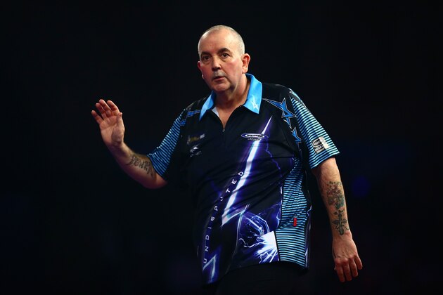 LONDON, ENGLAND - DECEMBER 30:  Phil Taylor of England looks dejected in his third round match against Jelle Klaasen of the Netherlands on Day Twelve of the 2016 William Hill PDC World Darts Championships at Alexandra Palace on December 30, 2015 in London, England.  (Photo by Jordan Mansfield/Getty Images)