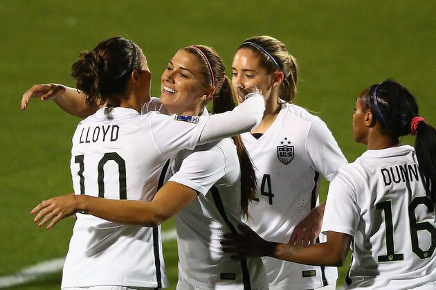 FRISCO, TX - FEBRUARY 10:  Alex Morgan #13 of USA celebrates her goal with Carli Lloyd #10, Morgan Brian #14 and Crystal Dunn #16 against Costa Rica during the 2016 CONCACAF Women's Olympic Qualifying at Toyota Stadium on February 10, 2016 in Frisco, Texas.  (Photo by Ronald Martinez/Getty Images)