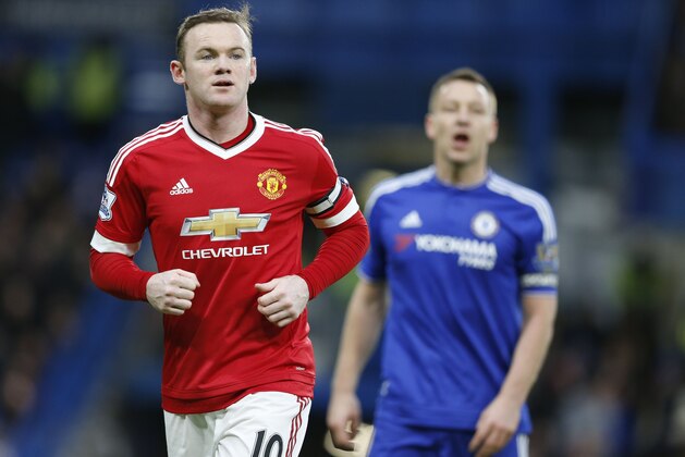 Manchester United's captain Wayne Rooney, and Chelsea's John Terry during the English Premier League soccer match between Chelsea and Manchester United at Stamford Bridge stadium in London, Sunday, Feb. 7, 2016.  (AP Photo/Frank Augstein)