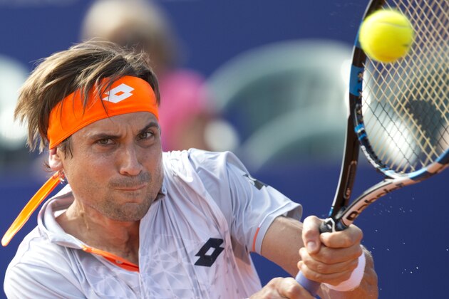 David Ferrer of Spain returns the ball to   Renzo Olivo of Argentina during the ATP Argentina Open in Buenos Aires, Argentina, Thursday, Feb. 11, 2016.(AP Photo/Natacha Pisarenko)