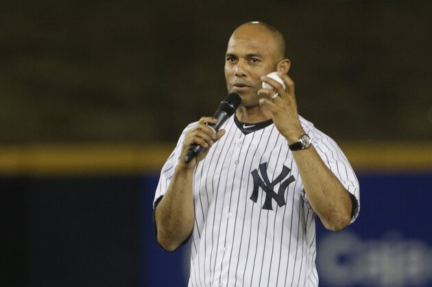 New York Yankees retired pitcher Mariano Rivera talks to the crowd before threw throwing a ceremonial first pitch at the exhibition baseball game of the