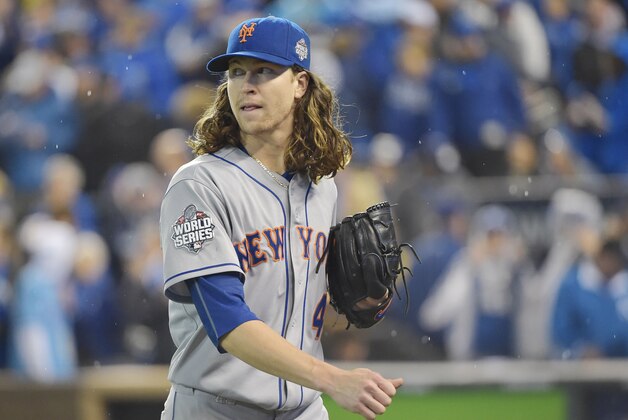 Oct 28, 2015; Kansas City, MO, USA; New York Mets starting pitcher Jacob deGrom (48) reacts as he walks to the dugout after the fifth inning against the Kansas City Royals in game two of the 2015 World Series at Kauffman Stadium. Mandatory Credit: Denny Medley-USA TODAY Sports