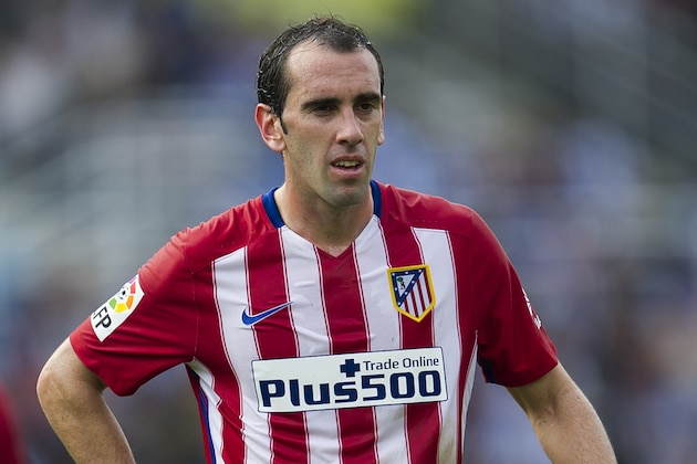 SAN SEBASTIAN, SPAIN - OCTOBER 18:  Diego Godin of Atletico de Madrid reacts during the La Liga match between Real Sociedad de Futbol and Atletico de Madrid at Estadio Anoeta on October 18, 2015 in San Sebastian, Spain.  (Photo by Juan Manuel Serrano Arce/Getty Images)