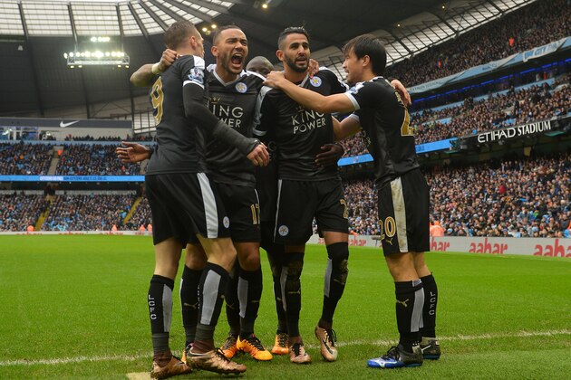 MANCHESTER, ENGLAND - FEBRUARY 06:  Riyad Mahrez (2nd R) of Leicester City celebrates scoring his team's second goal with his team mates Shinji Okazaki (1st R), Danny Simpson (2nd L) and Jamie Vardy (1st L) during the Barclays Premier League match between Manchester City and Leicester City at the Etihad Stadium on February 6, 2016 in Manchester, England.  (Photo by Michael Regan/Getty Images)