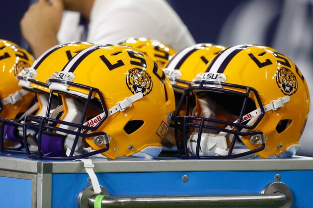 LSU helmets sit on the bench area during the Texas Bowl NCAA football game Tuesday, Dec. 29, 2015, in Houston. LSU won 56-27. (AP Photo/Bob Levey)
