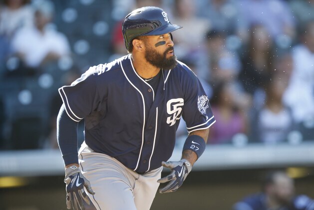 San Diego Padres right fielder Matt Kemp (27) follows the flight of his double against the Colorado Rockies in the fifth inning of a baseball game Sunday, Sept. 20, 2015, in Denver. San Diego won 10-4. (AP Photo/David Zalubowski)
