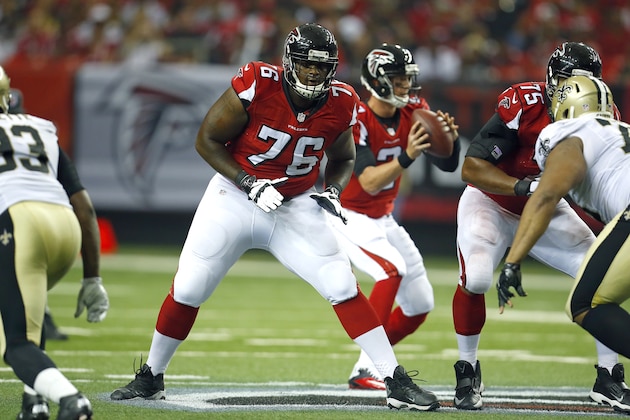 Atlanta Falcons tackle Lamar Holmes (76) readies to block against the New Orleans Saints during an NFL game at the Georgia Dome in Atlanta on Sunday, Sept. 7, 2014. (Jeff Haynes/AP Images for Panini)