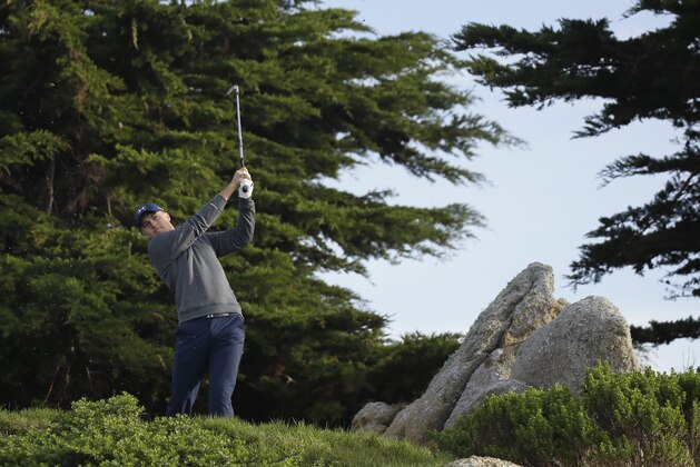 Jordan Spieth follows his shot from the 11th tee of the Monterey Peninsula Country Club Shore Course during the second round of the AT&T Pebble Beach National Pro-Am golf tournament Friday, Feb. 12, 2016, in Pebble Beach, Calif. (AP Photo/Eric Risberg)