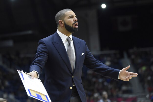 Feb 12, 2016; Toronto, Ontario, Canada; Canada celebrity head coach Drake during the All-Star celebrity basketball game at Ricoh Coliseum. Mandatory Credit: Peter Llewellyn-USA TODAY Sports