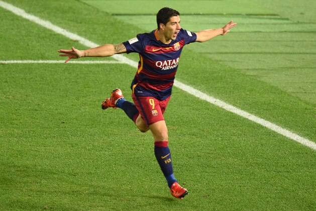 TOPSHOT - Barcelona forward Luis Suarez celebrates his goal against River Plate during the Club World Cup football final in Yokohama on December 20, 2015. AFP PHOTO / TORU YAMANAKA / AFP / TORU YAMANAKA        (Photo credit should read TORU YAMANAKA/AFP/Getty Images)