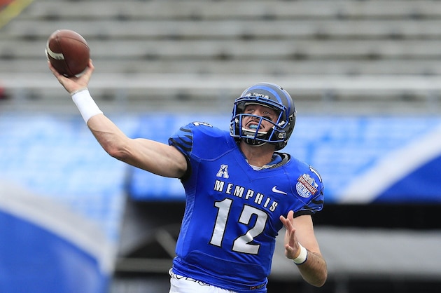 Dec 30, 2015; Birmingham, AL, USA; Memphis Tigers quarterback Paxton Lynch (12) passes against Auburn Tigersa in the 2015 Birmingham Bowl at Legion Field. Mandatory Credit: Marvin Gentry-USA TODAY Sports