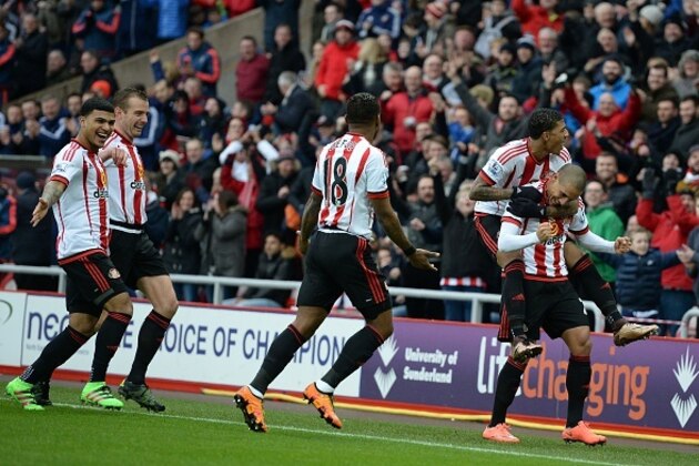 Sunderland's French-born Tunisian midfielder Wahbi Khazri (R) celebrates scoring his team's first goal with teammates during the English Premier League football match between Sunderland and Manchester United at the Stadium of Light in Sunderland, northeast England on February 13, 2016. / AFP / OLI SCARFF / RESTRICTED TO EDITORIAL USE. No use with unauthorized audio, video, data, fixture lists, club/league logos or 'live' services. Online in-match use limited to 75 images, no video emulation. No use in betting, games or single club/league/player publications.  /         (Photo credit should read OLI SCARFF/AFP/Getty Images)