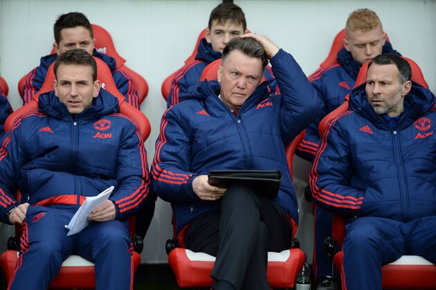 Manchester United's Dutch assistant coach Albert Stuivenberg, (L) Manchester United's Dutch manager Louis van Gaal (C) and Manchester United's Welsh assistant manager Ryan Giggs take their seats ahead of the English Premier League football match between Sunderland and Manchester United at the Stadium of Light in Sunderland, northeast England on February 13, 2016. / AFP / OLI SCARFF / RESTRICTED TO EDITORIAL USE. No use with unauthorized audio, video, data, fixture lists, club/league logos or 'live' services. Online in-match use limited to 75 images, no video emulation. No use in betting, games or single club/league/player publications.  /         (Photo credit should read OLI SCARFF/AFP/Getty Images)