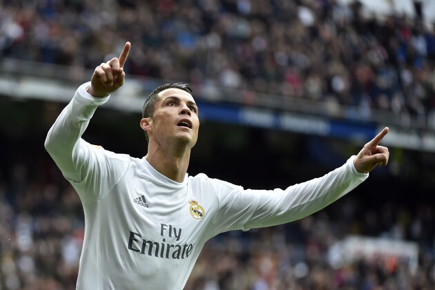 Real Madrid's Portuguese forward Cristiano Ronaldo celebrates after scoring during the Spanish league football match Real Madrid CF vs Athletic Club Bilbao at the Santiago Bernabeu stadium in Madrid on February 13, 2016. / AFP / GERARD JULIEN        (Photo credit should read GERARD JULIEN/AFP/Getty Images)