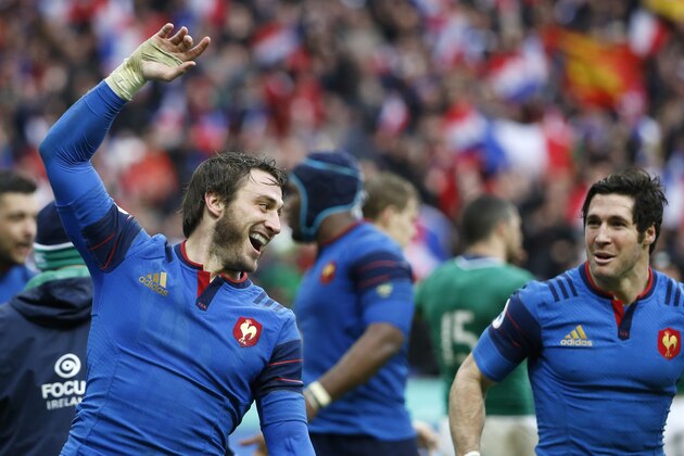 France's fullback Maxime Medard (L) celebrates with his teammate France's scrum-half Maxime Machenaud after scoring a try during the Six Nations international rugby union match between France and Ireland at the Stade de France Stadium in Saint-Denis, north of Paris, on February 13, 2016.    AFP PHOTO / THOMAS SAMSON / AFP / THOMAS SAMSON        (Photo credit should read THOMAS SAMSON/AFP/Getty Images)