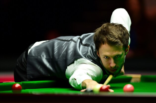LONDON, ENGLAND - JANUARY 15:  Judd Trump of England plays a shot during his quarter final match against Neil Robertson of Australia during Day Six of The Dafabet Masters at Alexandra Palace on January 15, 2016 in London, England.  (Photo by Dan Mullan/Getty Images)