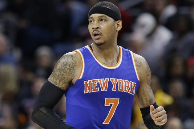 New York Knicks forward Carmelo Anthony walks up court during the second half of an NBA basketball game against the Detroit Pistons, Thursday, Feb. 4, 2016 in Auburn Hills, Mich. (AP Photo/Carlos Osorio)