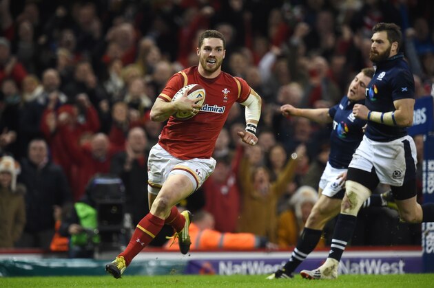Wales' wing George North runs in to score a try during the Six Nations international rugby union match between Wales and Scotland at the Principality Stadium in Cardiff, south Wales, on February 13, 2016. / AFP / PAUL ELLIS / RESTRICTED TO EDITORIAL USE. Use in books subject to Welsh Rugby Union (WRU) approval.        (Photo credit should read PAUL ELLIS/AFP/Getty Images)
