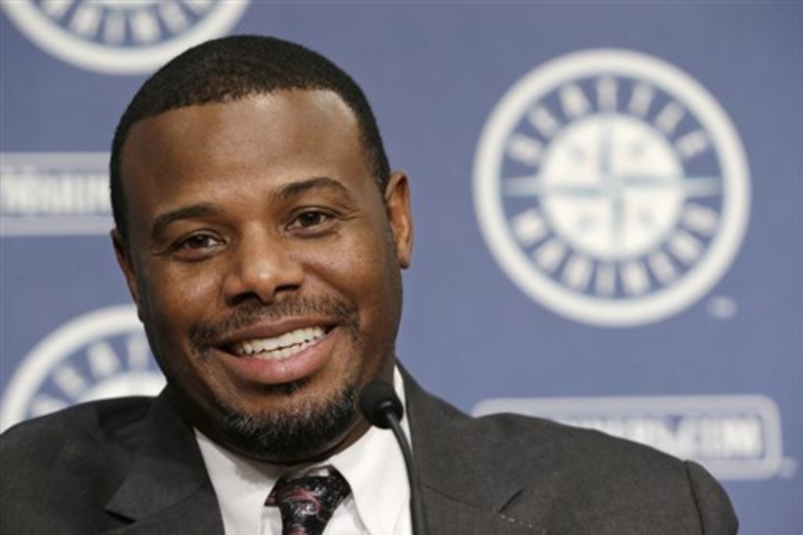 FILE - In this Aug. 9, 2013, file photo, former Seattle Mariners' Ken Griffey Jr. speaks at a news conference following a luncheon in his honor at the Mariners' ballpark in Seattle. Ken Griffey Jr. seems assured of election to the Baseball hall of Fame on the first try Wednesday, Jan. 6, 2016, possibly with a record vote of close to 100 percent. Mike Piazza, Jeff Bagwell and Tim Raines also were strong candidates to gain the 75 percent needed for baseball's highest honor.  (AP Photo/Elaine Thompson, File)