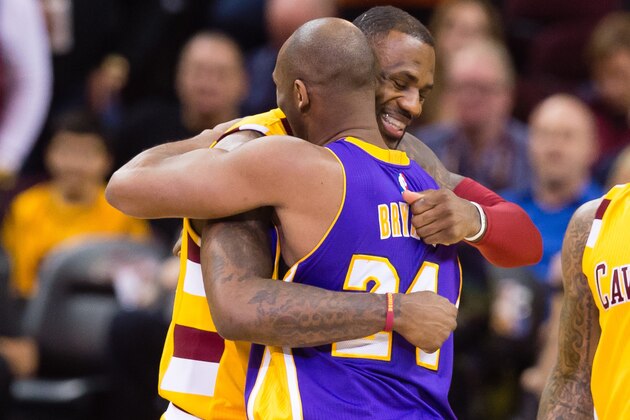 CLEVELAND, OH - FEBRUARY 10: LeBron James #23 of the Cleveland Cavaliers greets Kobe Bryant #24 of the Los Angeles Lakers during the first half at Quicken Loans Arena on February 10, 2016 in Cleveland, Ohio. NOTE TO USER: User expressly acknowledges and agrees that, by downloading and/or using this photograph, user is consenting to the terms and conditions of the Getty Images License Agreement. Mandatory copyright notice. (Photo by Jason Miller/Getty Images)