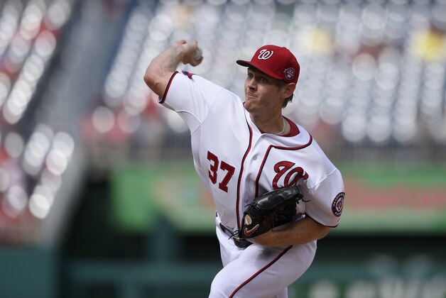Washington Nationals starting pitcher Stephen Strasburg (37) delivers a pitch against the Miami Marlins during a baseball game, Sunday, Sept. 20, 2015, in Washington. (AP Photo/Nick Wass)