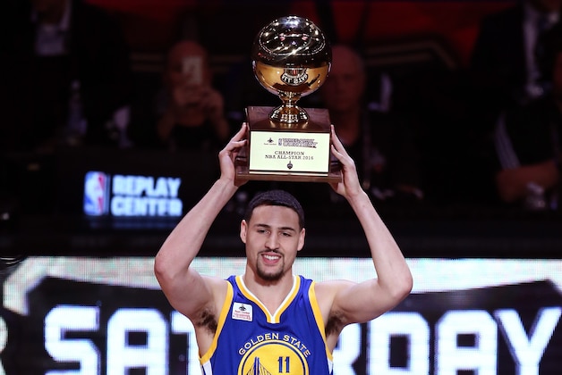 TORONTO, ON - FEBRUARY 13:  Klay Thompson of the Golden State Warriors holds up the trophy after winning the Foot Locker Three-Point Contest during NBA All-Star Weekend 2016 at Air Canada Centre on February 13, 2016 in Toronto, Canada. NOTE TO USER: User expressly acknowledges and agrees that, by downloading and/or using this Photograph, user is consenting to the terms and conditions of the Getty Images License Agreement.  (Photo by Vaughn Ridley/Getty Images)