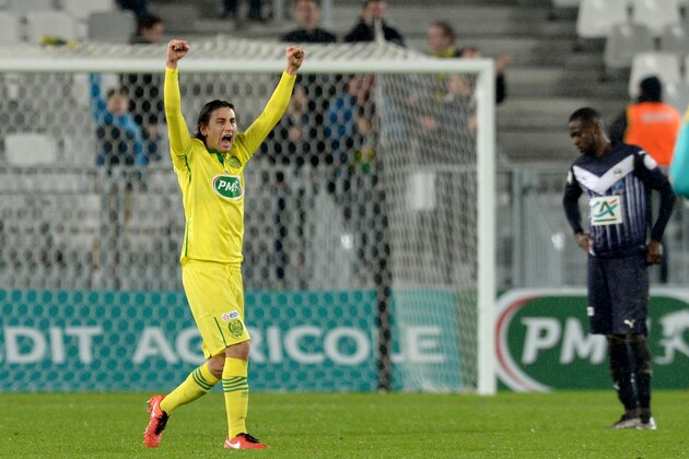 Nantes' US midfielder Alejandro Bedoya celebrates after winning the French Cup round of 16 football match between Bordeaux and Nantes on February 10, 2016 at the Matmut Atlantique stadium in Bordeaux, southwestern France.  AFP PHOTO / NICOLAS TUCAT / AFP / NICOLAS TUCAT        (Photo credit should read NICOLAS TUCAT/AFP/Getty Images)