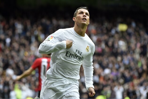 Real Madrid's Portuguese forward Cristiano Ronaldo celebrates after scoring during the Spanish league football match Real Madrid CF vs Athletic Club Bilbao at the Santiago Bernabeu stadium in Madrid on February 13, 2016. / AFP / GERARD JULIEN        (Photo credit should read GERARD JULIEN/AFP/Getty Images)