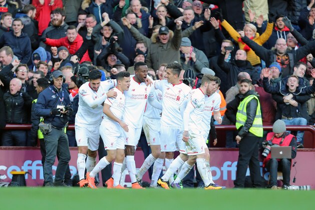 BIRMINGHAM, ENGLAND - FEBRUARY 14 : Divock Origi of Liverpool celebrates with his team-mates after scoring a goal to make it 0-4 during the Barclays Premier League match between Aston Villa and Liverpool at Villa Park on February 14, 2016 in Birmingham, England.  (Photo by James Baylis - AMA/ via Getty Images)
