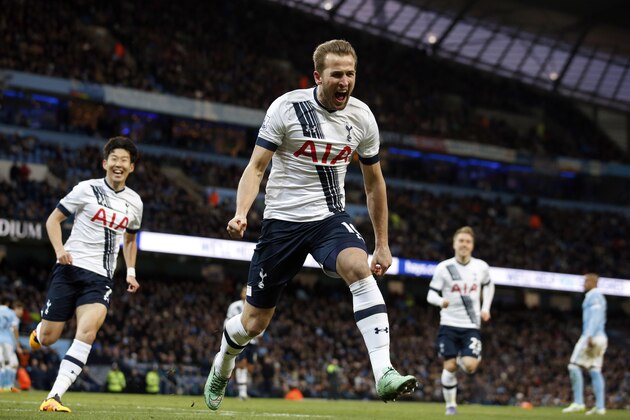 Tottenham's Harry Kane celebrates after scoring the opening goal during the English Premier League soccer match between Manchester City and Tottenham Hotspur's at the Etihad Stadium in Manchester, England, Sunday Feb. 14, 2016. (AP Photo/Jon Super)