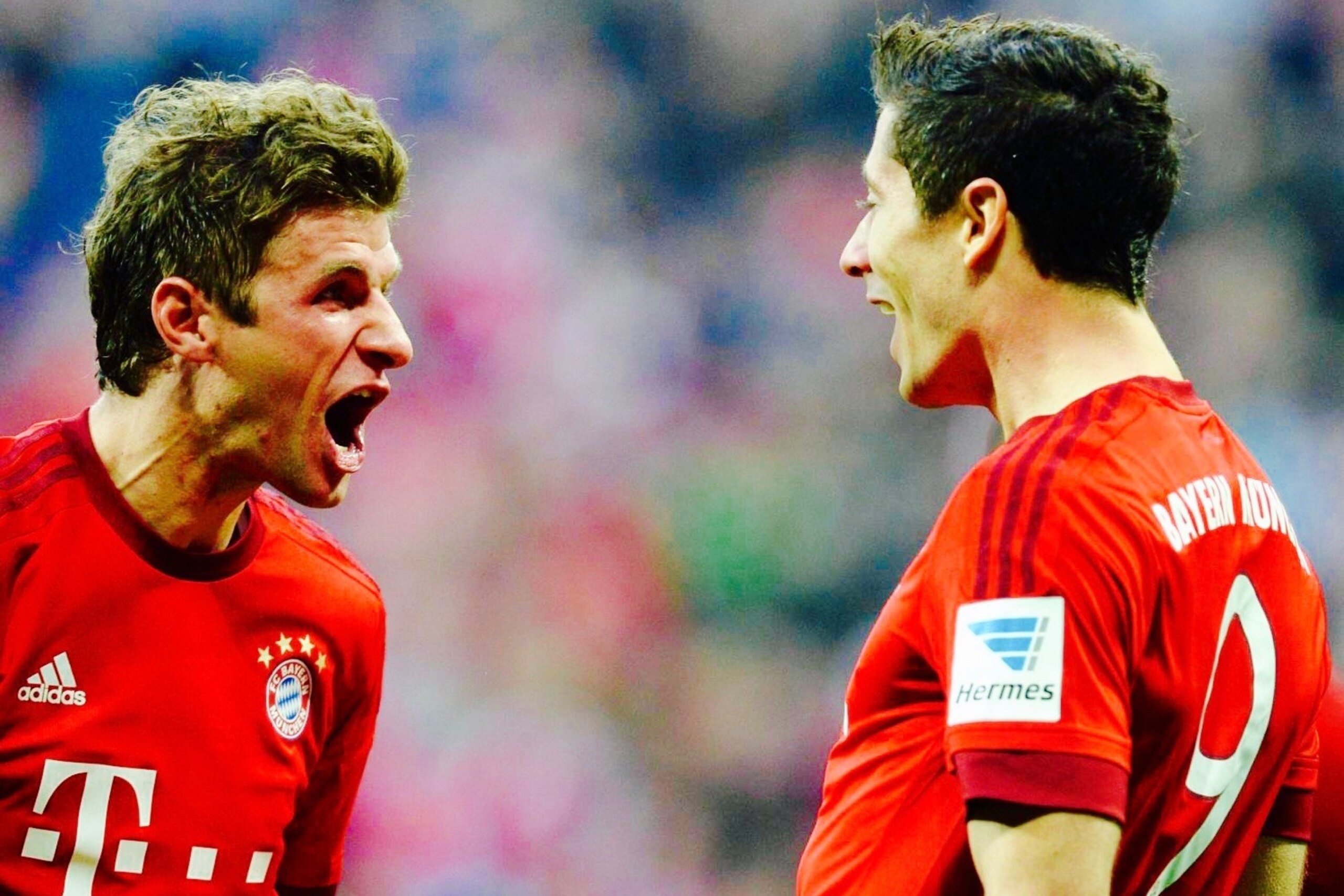 Bayern Munich's Polish striker Robert Lewandowski (R) and Bayern Munich's striker Thomas Mueller celebrate after Lewandowski scored the 0-1 goal during the German first division Bundesliga football match of FC Augsburg vs FC Bayern Munich in Augsburg, southern Germany, on February 14, 2016. / AFP / CHRISTOF STACHE / RESTRICTIONS: DURING MATCH TIME: DFL RULES TO LIMIT THE ONLINE USAGE TO 15 PICTURES PER MATCH AND FORBID IMAGE SEQUENCES TO SIMULATE VIDEO. == RESTRICTED TO EDITORIAL USE == FOR FURTHER QUERIES PLEASE CONTACT DFL DIRECTLY AT + 49 69 650050
(Photo credit should read CHRISTOF STACHE/AFP/Getty Images) Bayern Munich's Polish striker Robert Lewandowski (R) and Bayern Munich's striker Thomas Mueller celebrate after Lewandowski scored the 0-1 goal during the German first division Bundesliga football match of FC Augsburg vs FC Bayern Munich in Augsburg, southern Germany, on February 14, 2016. / AFP / CHRISTOF STACHE / RESTRICTIONS: DURING MATCH TIME: DFL RULES TO LIMIT THE ONLINE USAGE TO 15 PICTURES PER MATCH AND FORBID IMAGE SEQUENCES TO SIMULATE VIDEO. == RESTRICTED TO EDITORIAL USE == FOR FURTHER QUERIES PLEASE CONTACT DFL DIRECTLY AT + 49 69 650050
(Photo credit should read CHRISTOF STACHE/AFP/Getty Images)