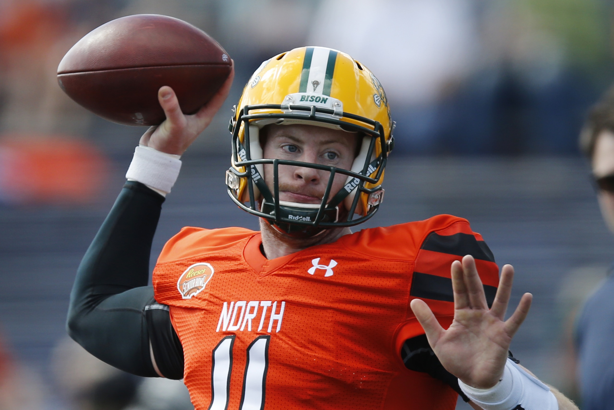 North Dakota State quarterback Carson Wentz warms up before the Senior Bowl NCAA college football game, Saturday, Jan. 30, 2016, at Ladd–Peebles Stadium, in Mobile, Ala. (AP Photo/Brynn Anderson)
