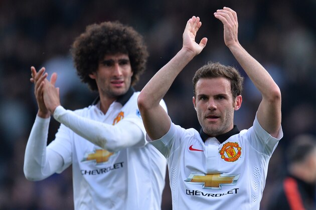 Manchester United's Belgian midfielder Marouane Fellaini (L) and Manchester United's Spanish midfielder Juan Mata (R) applaud at the end of the English Premier League football match between Crystal Palace and Manchester United at Selhurst Park in south London on May 9, 2015. AFP PHOTO / GLYN KIRK

RESTRICTED TO EDITORIAL USE. NO USE WITH UNAUTHORIZED AUDIO, VIDEO, DATA, FIXTURE LISTS, CLUB/LEAGUE LOGOS OR LIVE SERVICES. ONLINE IN-MATCH USE LIMITED TO 45 IMAGES, NO VIDEO EMULATION. NO USE IN BETTING, GAMES OR SINGLE CLUB/LEAGUE/PLAYER PUBLICATIONS.        (Photo credit should read GLYN KIRK/AFP/Getty Images)