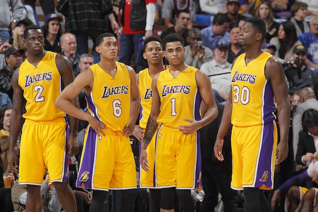 SACRAMENTO, CA - JANUARY 7: Brandon Bass #2, Jordan Clarkson #6, D'Angelo Russell #1 and Julius Randle #30 of the Los Angeles Lakers look on during the game against the Sacramento Kings on January 7, 2016 at Sleep Train Arena in Sacramento, California. NOTE TO USER: User expressly acknowledges and agrees that, by downloading and or using this photograph, User is consenting to the terms and conditions of the Getty Images Agreement. Mandatory Copyright Notice: Copyright 2016 NBAE (Photo by Rocky Widner/NBAE via Getty Images)