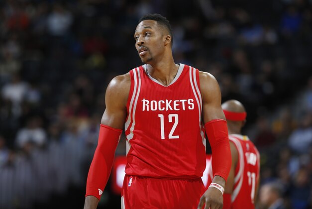 Houston Rockets center Dwight Howard (12) in the second half of an NBA basketball game Monday, Dec.14, 2015, in Denver. The Nuggets won 114-108. (AP Photo/David Zalubowski)