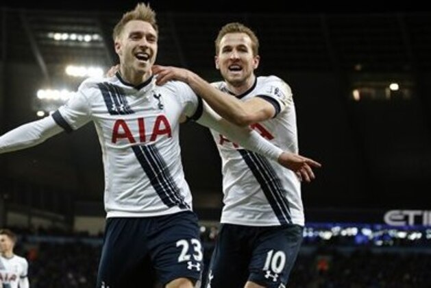 Tottenham's Christian Eriksen, left, celebrates  with Harry Kane after scoring his side’s second goal during the English Premier League soccer match between Manchester City and Tottenham Hotspur's at the Etihad Stadium in Manchester, England, Sunday Feb. 14, 2016. (AP Photo/Jon Super)