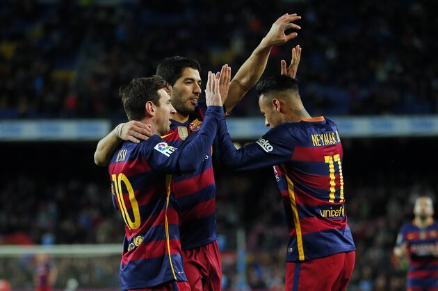 FC Barcelona's Neymar, right, celebrates a goal with his teammates Luis Suarez, center, and Lionel Messi against Celta Vigo during a Spanish La Liga soccer match at the Camp Nou stadium in Barcelona, Spain, Sunday, Feb. 14, 2016. (AP Photo/Manu Fernandez)