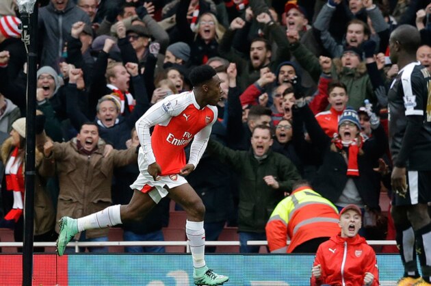 Arsenal's  Danny Welbeck celebrates after scoring his side’s second goal during the English Premier League soccer match between Arsenal and Leicester City at the Emirates Stadium in London, Sunday, Feb. 14, 2016.  (AP Photo/Matt Dunham)