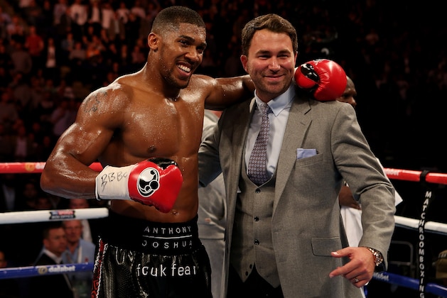 LONDON, ENGLAND - MAY 30:  Anthony Joshua of England poses with Promoter Eddie Hearn following his WBC International Heavyweight bout against Kevin Johnson of The USA at The O2 Arena on May 30, 2015 in London, England.  (Photo by Ben Hoskins/Getty Images)
