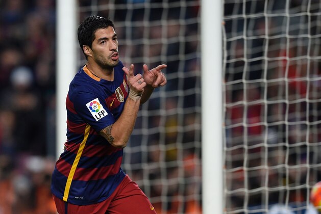 TOPSHOT - Barcelona's Uruguayan forward Luis Suarez celebrates a goal during the Spanish league football match FC Barcelona vs RC Celta de Vigo at the Camp Nou stadium in Barcelona on February 14, 2016.

 / AFP / LLUIS GENE        (Photo credit should read LLUIS GENE/AFP/Getty Images)