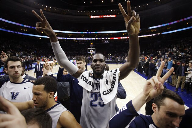 Villanova's Daniel Ochefu (23) celebrates after Villanova's 83-73 win over St. John's in an NCAA college basketball game Saturday, Feb. 13, 2016, in Philadelphia. (AP Photo/Matt Slocum)