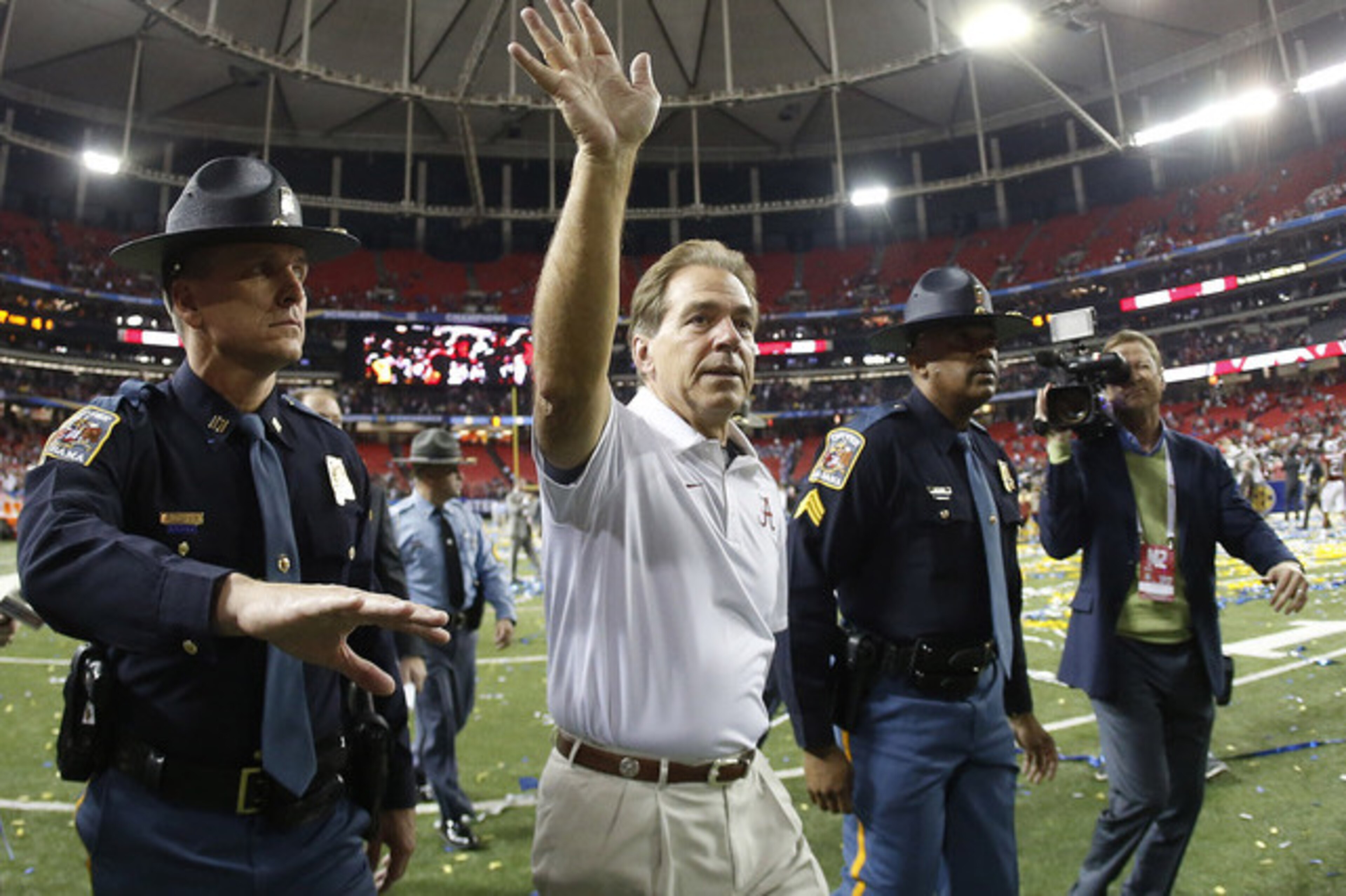 Alabama head coach Nick Saban walks off the field after the second half of the Southeastern Conference championship NCAA college football game against Florida, Saturday, Dec. 5, 2015, in Atlanta. Alabama won 29.15. (AP Photo/John Bazemore) Alabama head coach Nick Saban walks off the field after the second half of the Southeastern Conference championship NCAA college football game against Florida, Saturday, Dec. 5, 2015, in Atlanta. Alabama won 29.15. (AP Photo/John Bazemore)